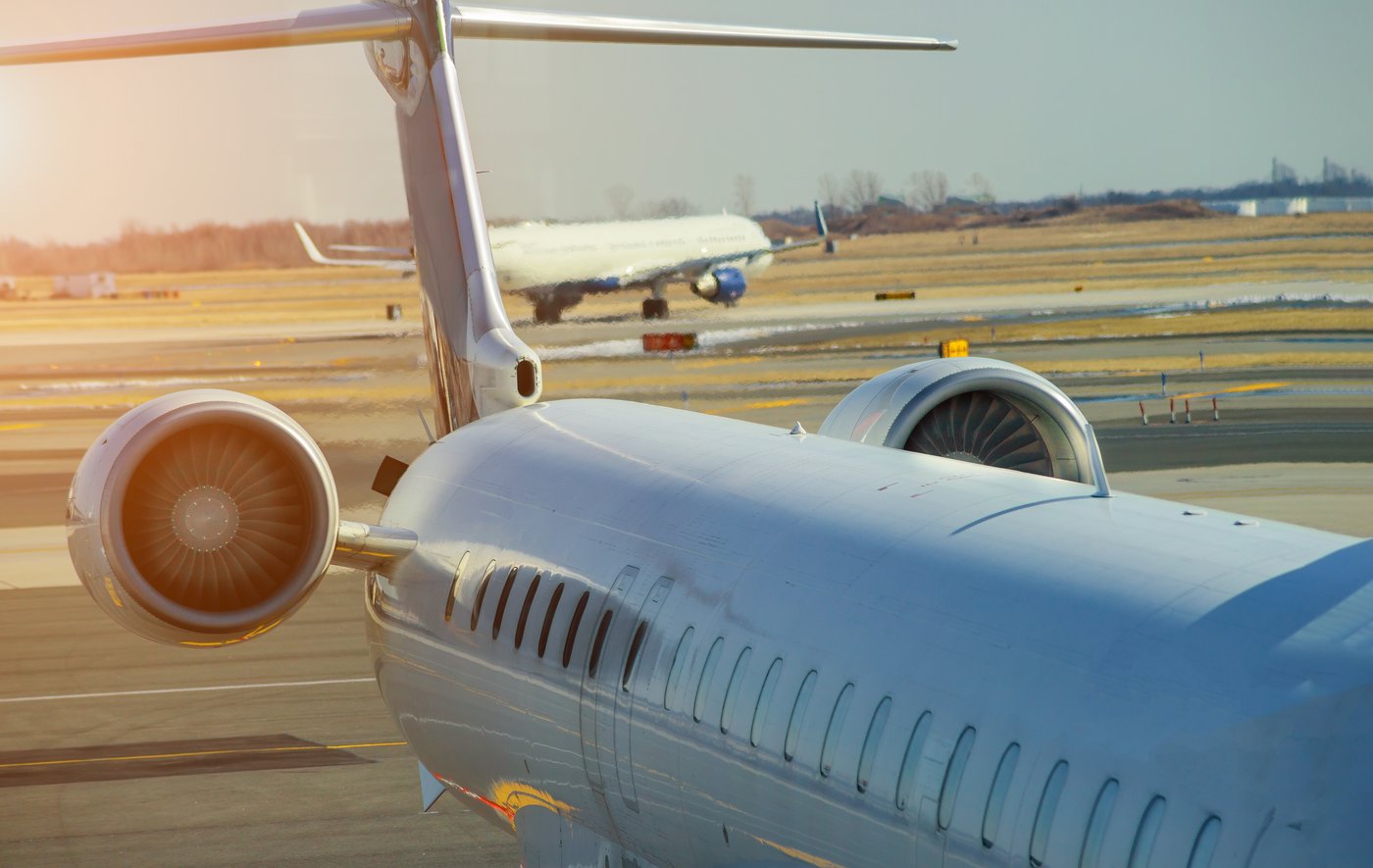 Aircraft tail and engines at golden hour