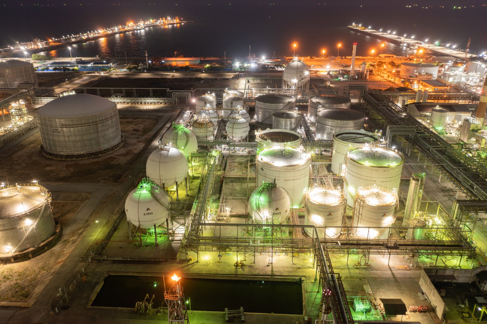 Processing plant lit up at night