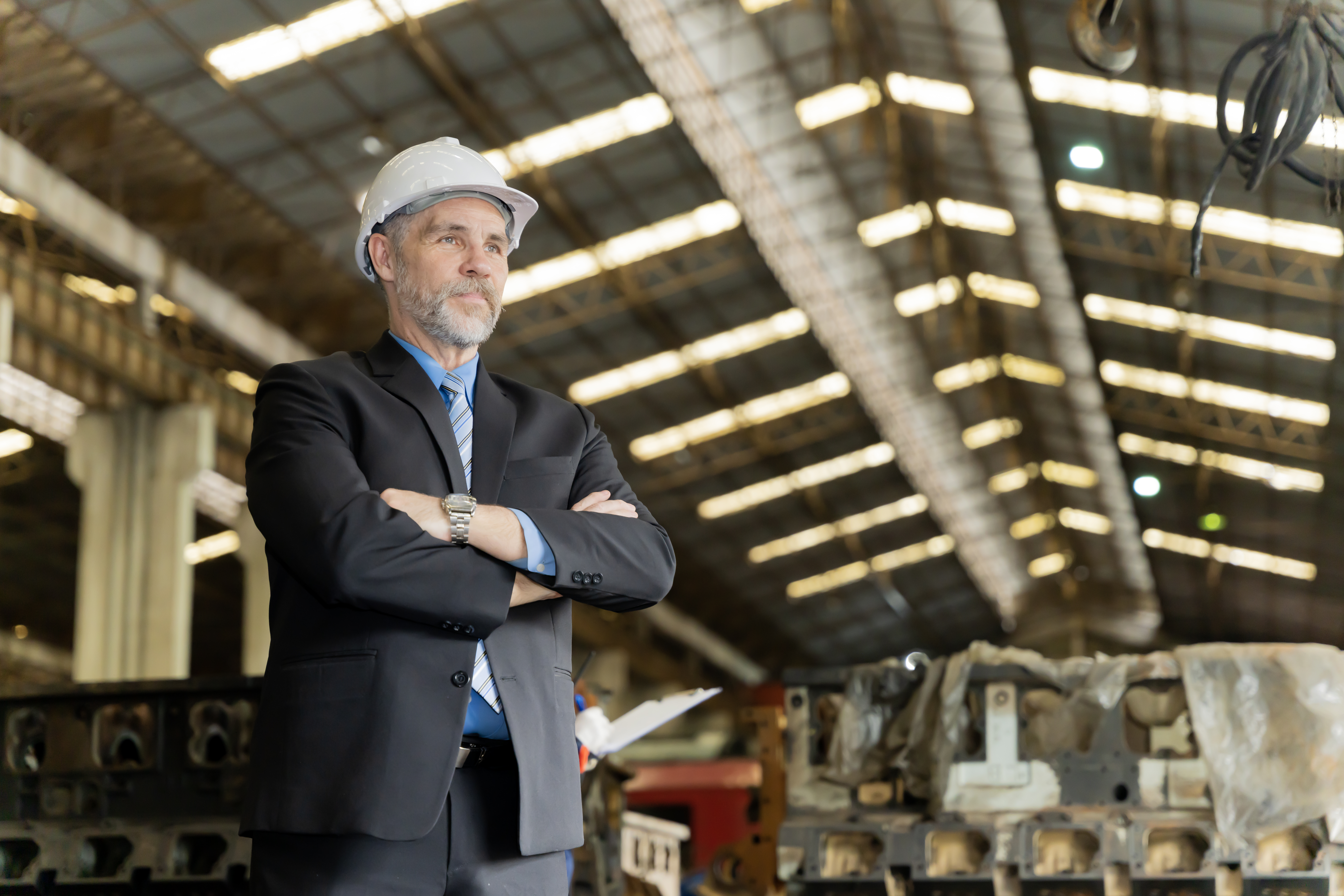 Plant manager reviewing manufacturing performance data and AI-generated insights on an operational intelligence platform.